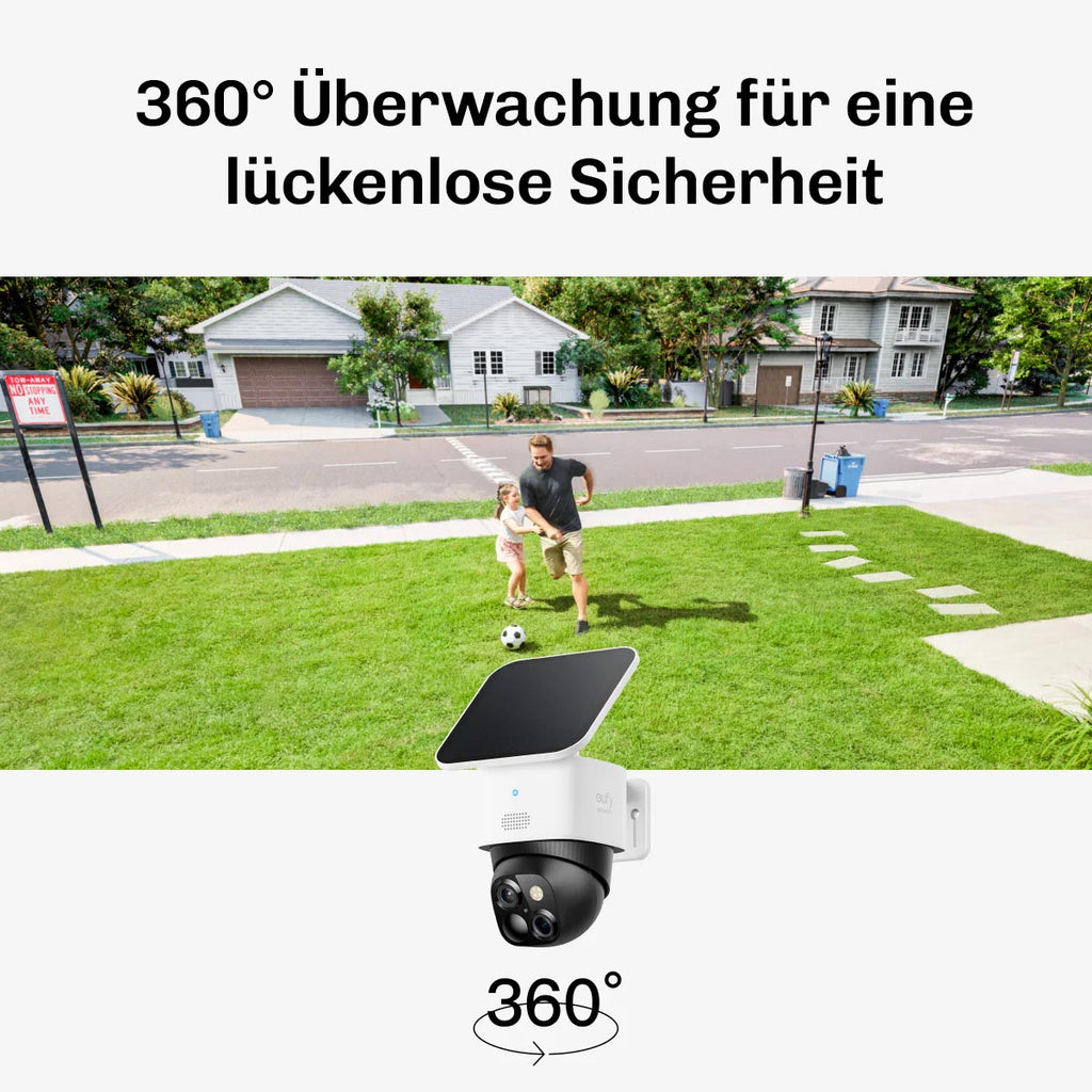 Solarkamera überwacht Garten, während Vater und Tochter Fußball spielen