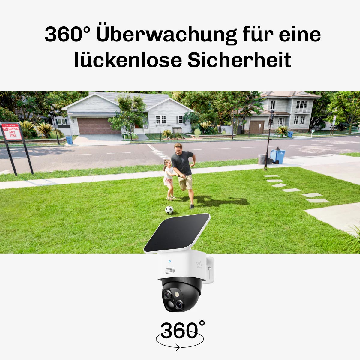 Solarkamera überwacht Garten, während Vater und Tochter Fußball spielen